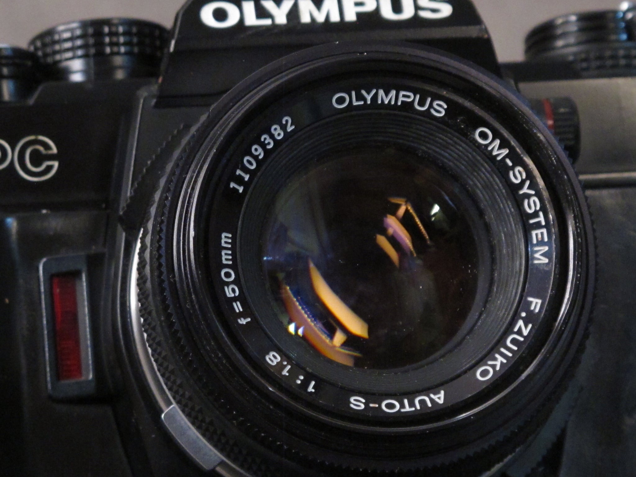 Olympus OM-PC 35mm camera with OM-SYSTEM F.ZUIKO AUTO-S f:50mm 1